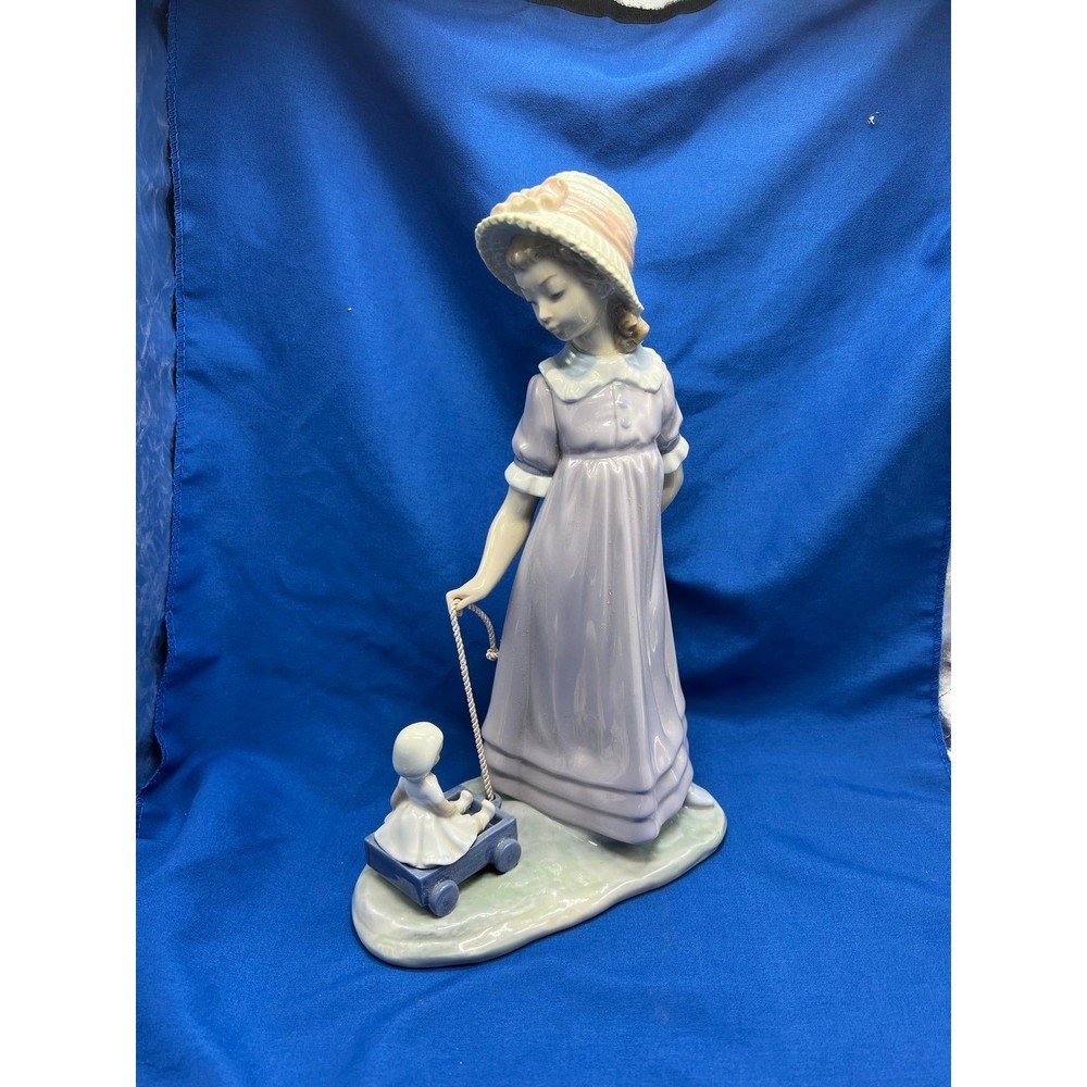 lladro figurine 5044 Girl pulling toy wagon 11 inches